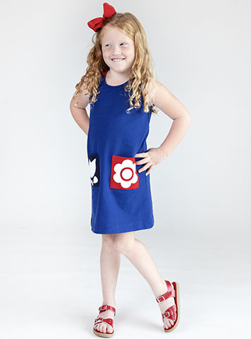 young girl in blue color block dress